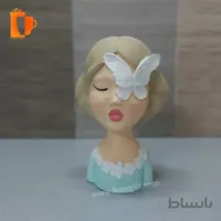 مجسمه پلی استری دختر چشم پروانه ای