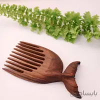 شانه دستساز چوبی طرح دم وال کد ۱۰۲۵۰۸