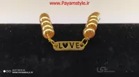 دستبند پلاک دار مروارید طرح LOVE رنگ طلایی
