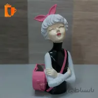 مجسمه پلی استری دختر کیف دار