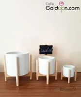 گلدان پلیمری استوانه به همراه پایه‌ چوبی
