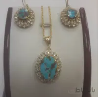 نیم ست نقره ابکاری طلا سنگ فیروزه اصل نیشابور کد ۱۰۱۰۸۸