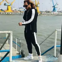 ست مردانه کد 026 هودی و شلوار طرح تک خط جنس دورس رنگ مشکی ا Men's set made of full-length Dors