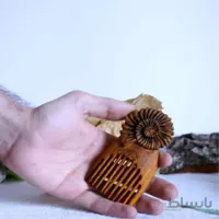 شانه چوبی دست ساز طرح آمونیت ا Handmade wooden comb ammonite design