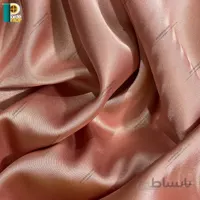 آستر پرده ساتن رنگ صورتی چرک همراه دوخت و نوار