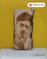 حک عکس بر روی تنه چوبی