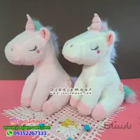 عروسک اسب تک شاخ نشسته