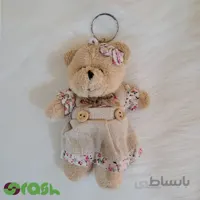 عروسک جاسوئیچی خرس کوچولو با لباس گل گلی ( ارتفاع ۱۲ سانتی متر )