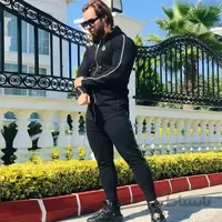 ست مردانه کد 023 هودی و شلوار طرح زیپ دار جنس دورس رنگ مشکی ا Men's zippered set made of full-length Dors