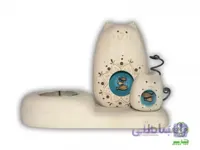جاشمعی گربه ماهی بدل وبچه| 1025 ا ابعاد تقریبی : 15x10 cm نکته مهم : طرح روی بدن مجسمه ها ممکن است با طرح روی عکس متفاوت باشد به علت دست ساز بودن تمامی محصولات، احتمال اندکی تفاوت وجود دارد