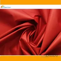 پارچه شمعی قرمز پشت نقره ای عرض 150