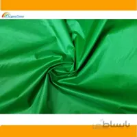 پارچه شمعی سبز پشت نقره ای عرض 150