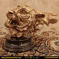مجسمه برنزی کله ببر پایه سنگی