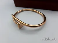 دستبند کارتیر رزگلد میخی