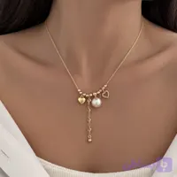 گردنبند طرح طلا قلب و مروارید