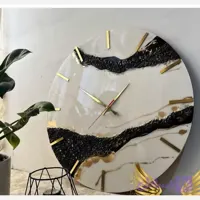 ساعت دیواری رزینی طرح سفید مشکی