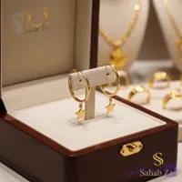 گوشواره حلقوی طلای ۱۸ عیار مدل ستاره با قفل بیخ گوشی – طراحی مینیمال | سحاب زر