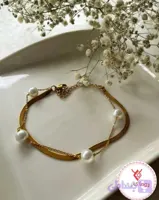 دستبند دولاین ماری مرواریدی طلایی