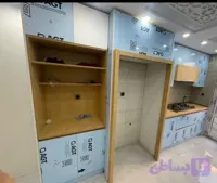 کابینت سفارشی هایگلاس وام دی اف دررنگ بندی وطراحی همراه کافی بار کد۷۴۵