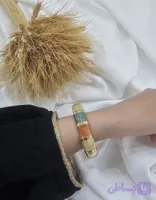 بنگل طبیعت رنگی منحصر بفرد از دل طبیعت آبکاری طلا شده و رنگش ثابت و مناسب استفاده روزانه و قابل استایل شدن هستش از آویدخت