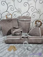 ست پیکنیک پارچه‌ای شامل کاور فلاسک دوقلو، قابلمه و سبد لانچ باکس