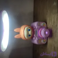 چراغ مطالعه، مدل لبوبو همراه با چند عکس روی حلقه فیلم، کد 534
