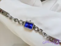 ساعت مچی زنانه صفحه ابی دور قاب نگین بک استیل
