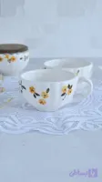 فنجان لته خوری گل زرد سرامیکی نیلابی