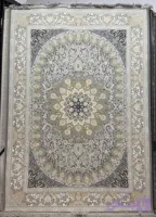 فرش ماشینی ۱۲۰۰ شانه ۹ متری طرح ترنج زمینه فیلی (کد W6C0Y)