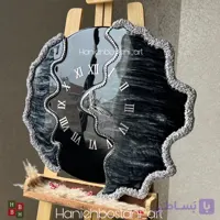 ساعت دیواری طرح دفرمه رزینی مشکی، نقره ای نگین دار