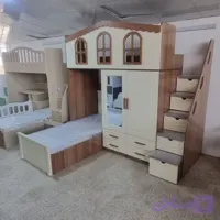 تخت دو طبقه طرح کلبه مدل کمد دار