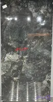 سرامیک اسلب نوین سرام طرح سنگ موسبی مشکی براق سایز 120*270