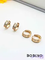 گوشواره ژوپینگ طلایی مدل حلقه هوپی طرح ورساچه نگین‌دار | رنگ ثابت و ضدحساسیت