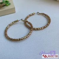گوشواره حلقه‌ای مهره‌ای طلایی برند اکسسوریز