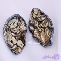 گوشواره دفرمه مشکی با گلهای طلایی