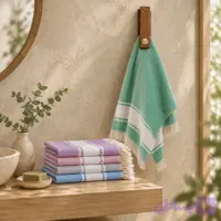 جا حوله‌ای دیواری چوبی گرانشی هنر دست به همراه حوله دستباف نخ پنبه