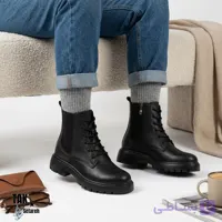 بوت کمبت زنانه مدل چانکی بندی (طراحی ترندی استریت‌ویر زمستانه، ترکیب بند و کشبافت با زیپ بغل آسان‌پوش و زیره لژدار تراکتوری دندانه‌دار)