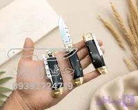 چاقو جیبی فشاری دسته فیبر مشکی تیغه استیل ضد زنگ