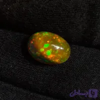 نگین جواهری اوپال آتشین طلایی با طلعلع بالا خاص و کمیاب