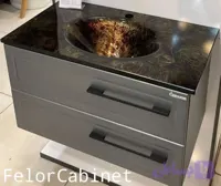 کابینت روشویی پی وی سی مدل 1061 با صفحه روشویی شیشه‌ای مشکی طلایی