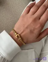 بنگل طرح دار زنانه تمام استیل طلایی