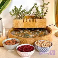 آبنما سنگی گرد بدنه صاف سنگدانه کد AB125S همراه با گیاه خرفه