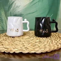 ⁣ ماگ مدل home⁣ ⁣سرامیکی ⁣درب دار⁣