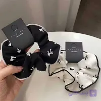 کش مو اسکرانچی طرح گل چهار برگ
