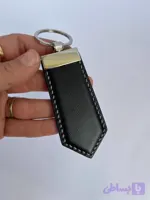 جاکلیدی چرم پرادا مشکی با دوخت اریب