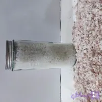 دلنمک جهرم 1400گرمی در ظرف شیشه ای استوانه ای با درب کانتینری فلزی دهانه 82میلیمتر