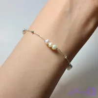 دستبند مروارید پرورشی و گوی نقره - نین گالری