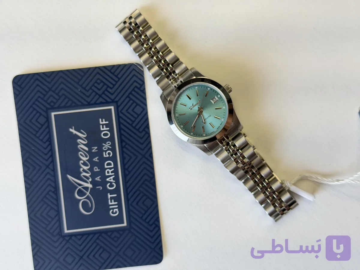 ساعت اکسنت زنانه بند فلزی صفحه گرد رنگی AX160041