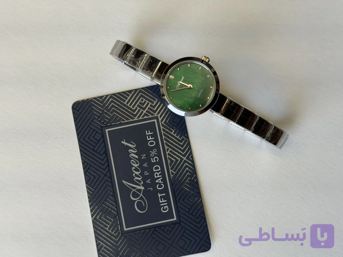 ساعت اکسنت زنانه بند فلزی صفحه گرد رنگی AX120023