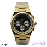 ساعت مردانه TISSOT طلایی، صفحه مشکی کرنوگراف، بند استیل طلایی، قاب چندضلعی، نمایش تاریخ، موتور کوارتز و قفل پروانه‌ای مدل T137410A
